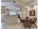 Breakfast bar and eat-in kitchen area with natural light at 8245 E Bell Rd # 128, Scottsdale, AZ 85260