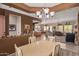 Large dining room with open plan into the carpeted living space at 8307 S Desert Preserve Ct, Gold Canyon, AZ 85118