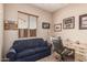Cozy home office features natural light, a comfortable sofa, and ample desk space at 8307 S Desert Preserve Ct, Gold Canyon, AZ 85118