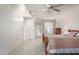 Carpeted main bedroom with ceiling fan and neutral walls at 10619 W Highwood Ln, Sun City, AZ 85373