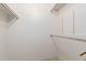 Spacious walk-in closet with adjustable shelving and rods, ready for organization at 10619 W Highwood Ln, Sun City, AZ 85373