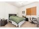 Cozy bedroom with desk and plush carpet, providing a functional living space at 1074 E Carla Vista Ct, Gilbert, AZ 85295