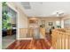 Upstairs hallway with hardwood floors, a ceiling fan, and access to the bedrooms at 1074 E Carla Vista Ct, Gilbert, AZ 85295
