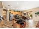 Well-appointed kitchen with black countertops, stainless steel appliances, and a breakfast bar with stools at 1074 E Carla Vista Ct, Gilbert, AZ 85295