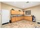 Spacious room with lots of cabinets, tile floor, and a window providing natural light at 1074 E Carla Vista Ct, Gilbert, AZ 85295