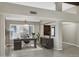 Bright home office with ample natural light, modern furniture, and a calming workspace at 10809 N 111Th Pl, Scottsdale, AZ 85259