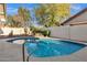 Sparkling pool with desert landscaping and a peaceful atmosphere in the backyard at 10809 N 111Th Pl, Scottsdale, AZ 85259