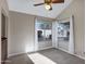 Bright room with tile floors and two windows creating a welcoming and versatile space at 10809 N 111Th Pl, Scottsdale, AZ 85259