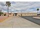 Community building and entrance with manicured landscaping at 110 S 72Nd Way, Mesa, AZ 85208