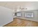 Spacious living room features new floors, lots of windows, and ceiling fan at 110 S 72Nd Way, Mesa, AZ 85208