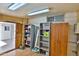 Well-lit storage area with shelving and laminate flooring at 110 S 72Nd Way, Mesa, AZ 85208