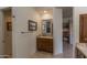 Well-lit powder room features vanity, mirror, and neutral decor at 11736 E Del Timbre Dr, Scottsdale, AZ 85259