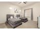 Cozy bedroom with two twin beds and neutral decor providing an inviting atmosphere at 12031 S 184Th Ave, Goodyear, AZ 85338