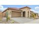 Charming single-story home with a two-car garage and low-maintenance desert landscaping at 12031 S 184Th Ave, Goodyear, AZ 85338