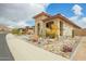 Beautiful desert home featuring drought-tolerant landscaping and a barrel tile roof at 12031 S 184Th Ave, Goodyear, AZ 85338
