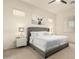 Spacious main bedroom features neutral tones, modern décor and ample natural light at 12031 S 184Th Ave, Goodyear, AZ 85338