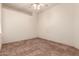 Bedroom with ceramic tile flooring, a ceiling fan and ample sunlight at 1211 W Hawken Way, Chandler, AZ 85286