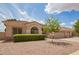 Charming single-story home with a three-car garage and well-maintained desert landscaping at 1211 W Hawken Way, Chandler, AZ 85286