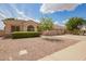 Charming single-story home with a three-car garage and well-maintained desert landscaping at 1211 W Hawken Way, Chandler, AZ 85286