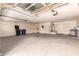 Spacious garage with high ceilings, ample lighting, and plenty of room for parking and storage at 1211 W Hawken Way, Chandler, AZ 85286