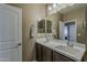 Bathroom with double sinks, modern fixtures, and neutral color palette at 1367 S Country Club Dr # 1189, Mesa, AZ 85210
