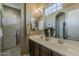 Bathroom with double sinks, white countertops, and modern fixtures at 1367 S Country Club Dr # 1189, Mesa, AZ 85210