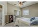 Bedroom with ceiling fan, carpet flooring, and ample natural light at 1367 S Country Club Dr # 1189, Mesa, AZ 85210