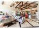 Spacious lobby featuring soaring ceilings, exposed beams, stylish chandeliers, and elegant furnishings, making a grand statement at 1367 S Country Club Dr # 1189, Mesa, AZ 85210