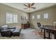 Office space featuring a comfortable seating area and multiple windows at 1367 S Country Club Dr # 1189, Mesa, AZ 85210