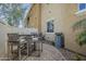 Cozy patio with brick pavers and a dining set, offering a private outdoor space at 1367 S Country Club Dr # 1189, Mesa, AZ 85210