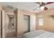 Relaxing bedroom with a closet and access to the hallway at 14239 W Port Royale Ln, Surprise, AZ 85379