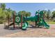Close up of the community playground featuring slides, climbing areas, and other play features at 14239 W Port Royale Ln, Surprise, AZ 85379