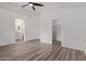 Bright primary bedroom with ensuite bathroom and walk-in closet at 14722 W Lucas Ln, Surprise, AZ 85374
