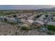 Dusk aerial view of neighborhood featuring spacious backyards with pools, spas, and outdoor entertaining areas at 15413 S 31St Pl, Phoenix, AZ 85048