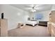 Bright bedroom featuring clean white walls, plush carpeting, and neutral decor, creating a relaxing space at 15413 S 31St Pl, Phoenix, AZ 85048