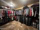 Spacious walk-in closet with extensive hanging racks and shelving for maximum storage and organization at 15413 S 31St Pl, Phoenix, AZ 85048