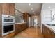 Well-equipped kitchen with modern appliances, sleek cabinetry, and ample countertop space at 1621 E Maryland Ave, Phoenix, AZ 85016
