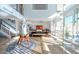 Bright and airy living space with large windows, modern decor, and stylish furnishings at 1621 E Maryland Ave, Phoenix, AZ 85016