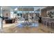 Spacious open-concept living area with floor-to-ceiling windows and modern furnishings at 1621 E Maryland Ave, Phoenix, AZ 85016