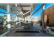 View of outdoor dining on covered patio with pool in the background and lots of natural light at 1621 E Maryland Ave, Phoenix, AZ 85016