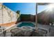 Backyard pool and lounge area. Backyard features privacy wall and lush landscaping at 1621 E Maryland Ave, Phoenix, AZ 85016