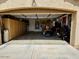 Spacious two car garage with storage cabinets and ample room for parking and projects at 16424 W Cottonwood St, Surprise, AZ 85388