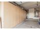 Spacious garage featuring custom cabinets for organized storage solutions at 16424 W Cottonwood St, Surprise, AZ 85388