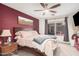 Cozy main bedroom with a ceiling fan and good natural light at 16424 W Cottonwood St, Surprise, AZ 85388