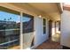 Outdoor patio with a wood floor and sliding glass doors at 1645 W Baseline W Rd # 2032, Mesa, AZ 85202