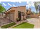Fenced backyard with decorative rocks and desert landscaping is perfect for relaxing at 1658 N Sierra Vista Dr, Tempe, AZ 85288