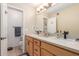 Bathroom featuring a double vanity, updated lighting and fixtures at 1658 N Sierra Vista Dr, Tempe, AZ 85288
