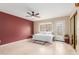 Spacious bedroom with natural lighting, ceiling fan and sliding mirror closet at 1658 N Sierra Vista Dr, Tempe, AZ 85288