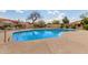 Inviting community pool with ample lounge chairs, perfect for relaxation and socializing at 1658 N Sierra Vista Dr, Tempe, AZ 85288