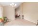 Bright dining room with tiled floor, chandelier lighting and easy access to the living area at 1658 N Sierra Vista Dr, Tempe, AZ 85288